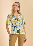 Front view of short sleeve V-neck top featuring a vibrant Pacific paisley print by French Dressing Jeans (FDJ)