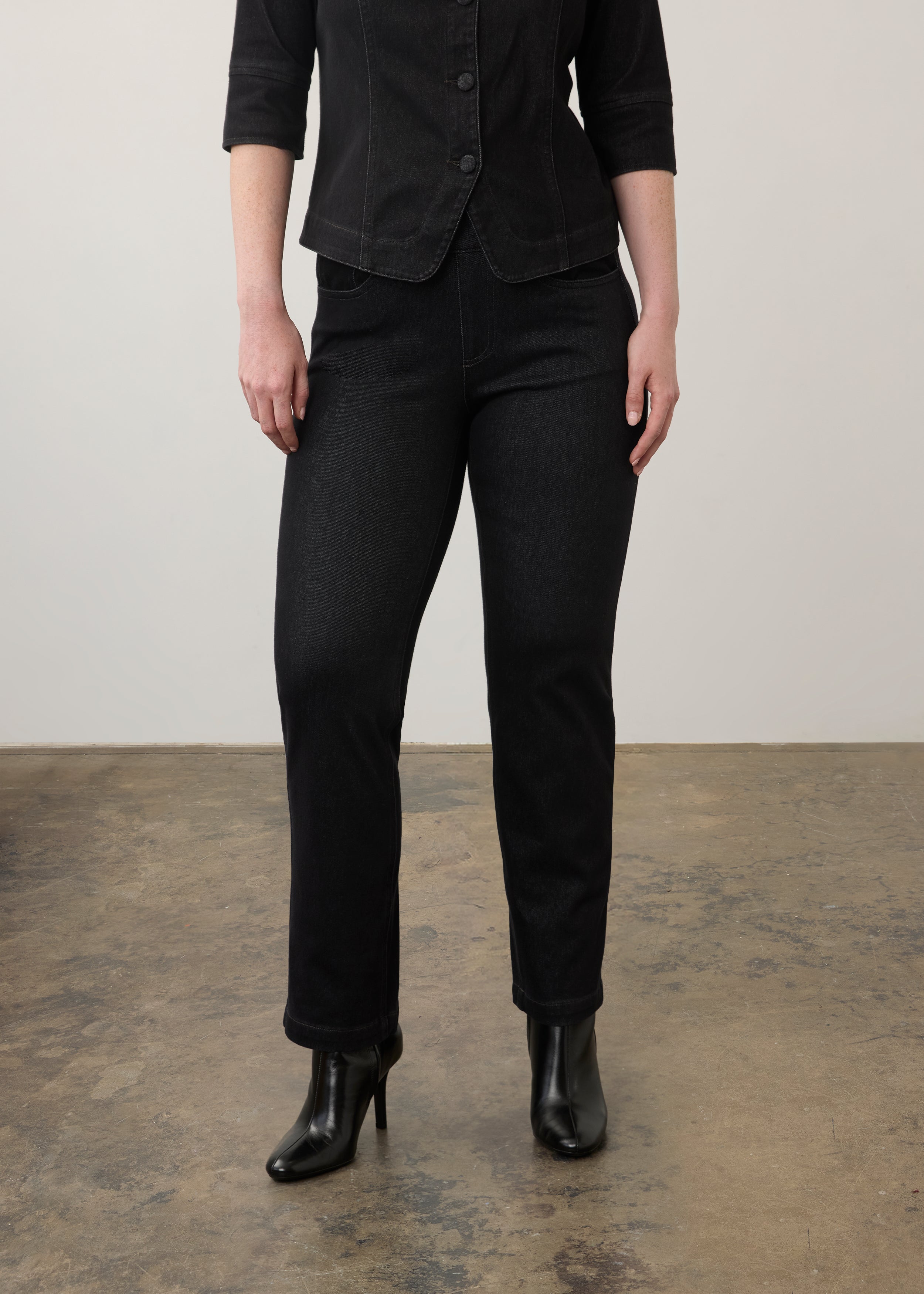 Black straight-leg jeans with front view showing classic fit and pocket design by French Dressing Jeans (FDJ)