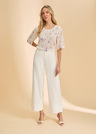 Full front view of white/red stripe sweater paired with white pants by French Dressing Jeans (FDJ)