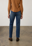 Back view of medium blue jeans with tailored fit and clean hem by French Dressing Jeans (FDJ) par French Dressing Jeans (FDJ)