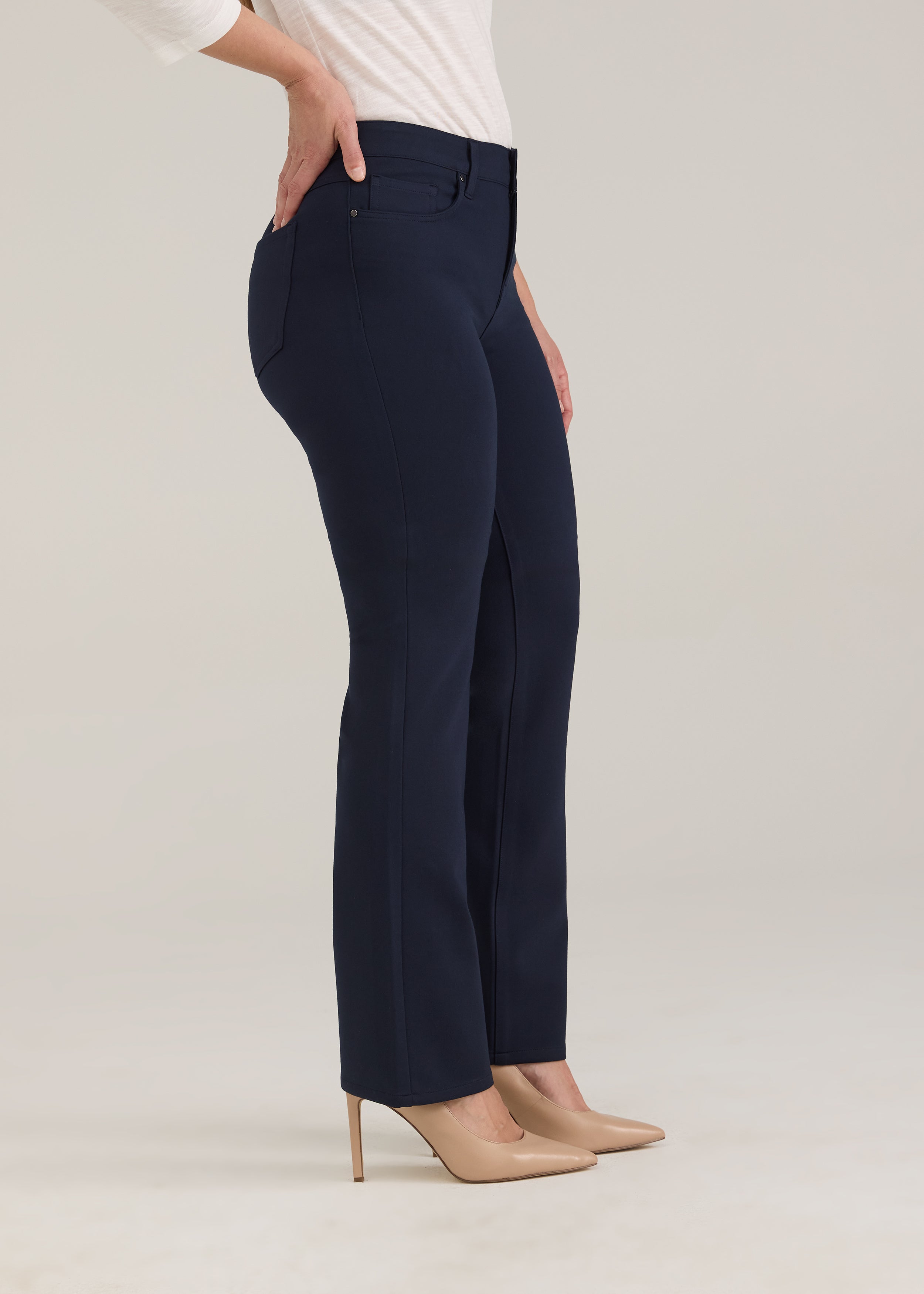 Side profile of navy pants showing ankle length and fit by French Dressing Jeans (FDJ)