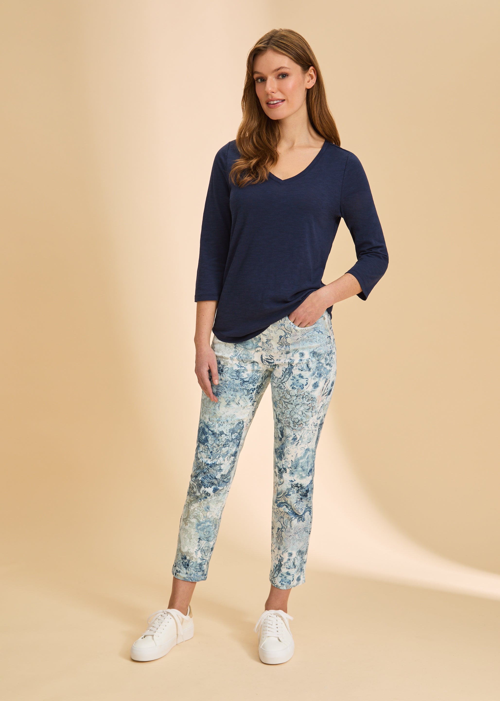 Full outfit with navy V-neck 3/4 sleeve top and patterned pants for a stylish look by French Dressing Jeans (FDJ)