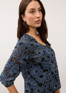 Side view of floral lace blouse highlighting texture and pattern by French Dressing Jeans (FDJ)