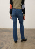Back view of medium blue Olivia denim showcasing back patch pockets by French Dressing Jeans (FDJ)