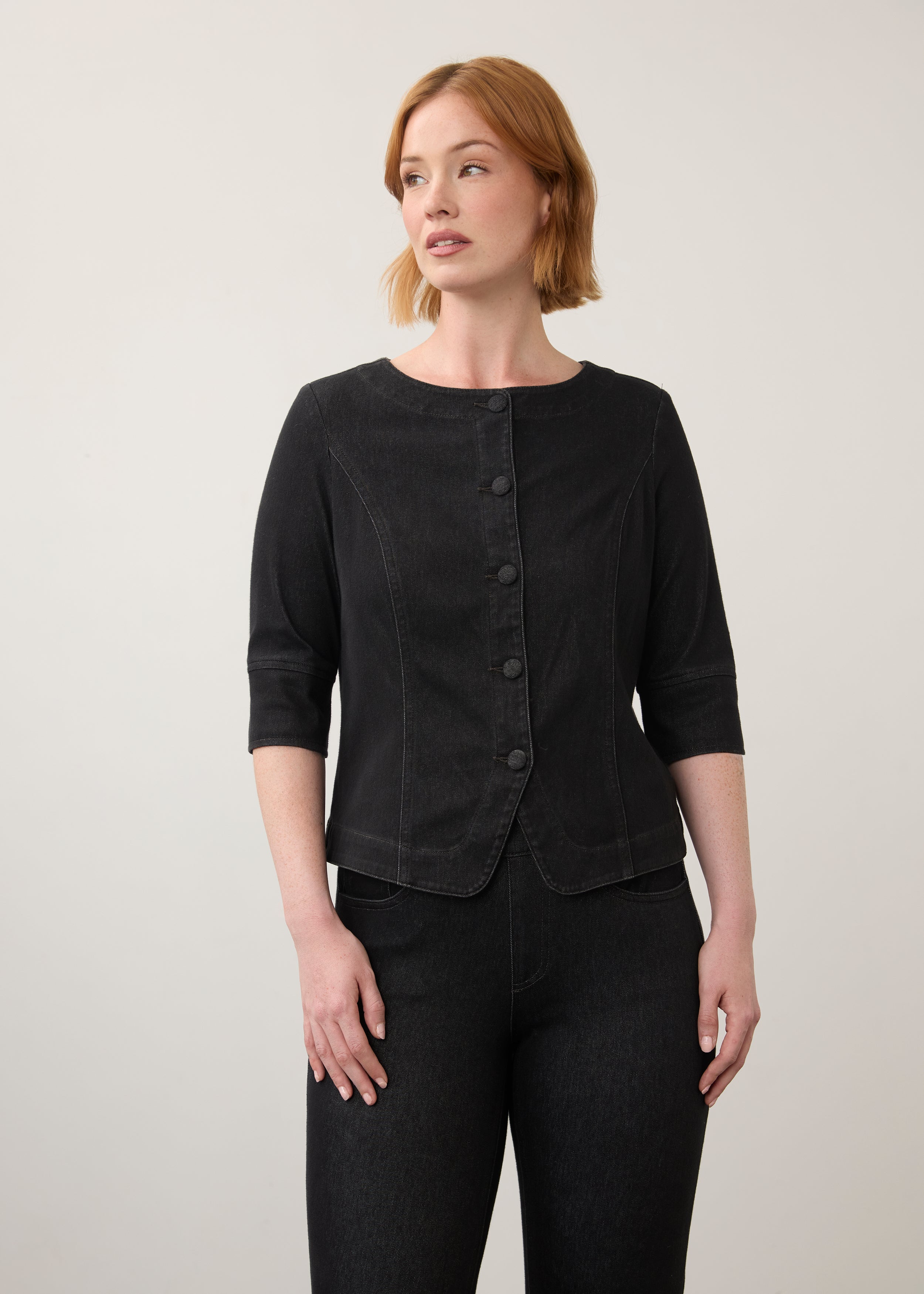 Black button-up top with elbow-length sleeves paired with dark jeans front view by French Dressing Jeans (FDJ)