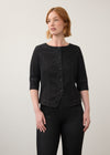 Black button-up top with elbow-length sleeves paired with dark jeans front view by French Dressing Jeans (FDJ)