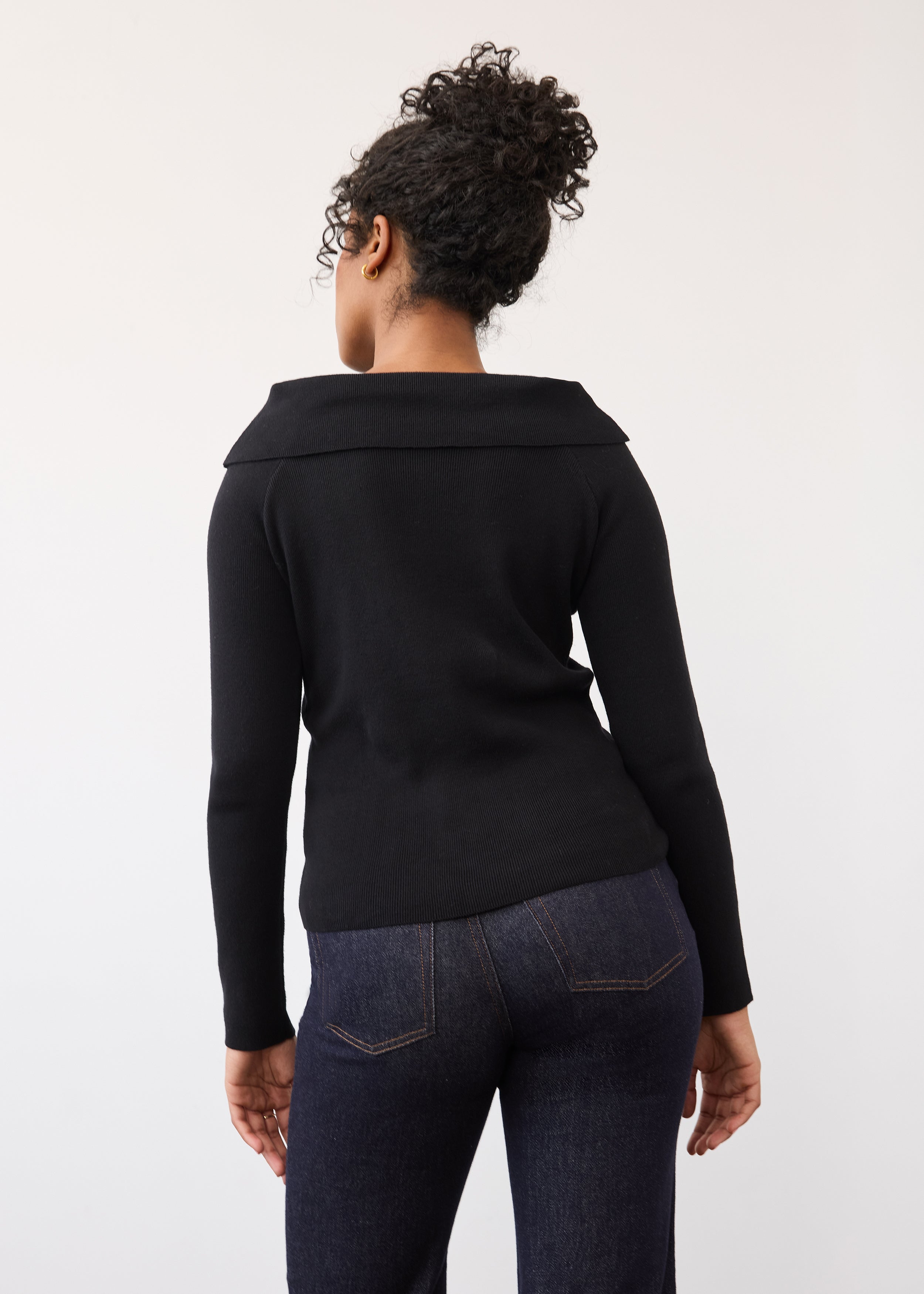 Back view of black off-the-shoulder sweater showing fit by French Dressing Jeans (FDJ)