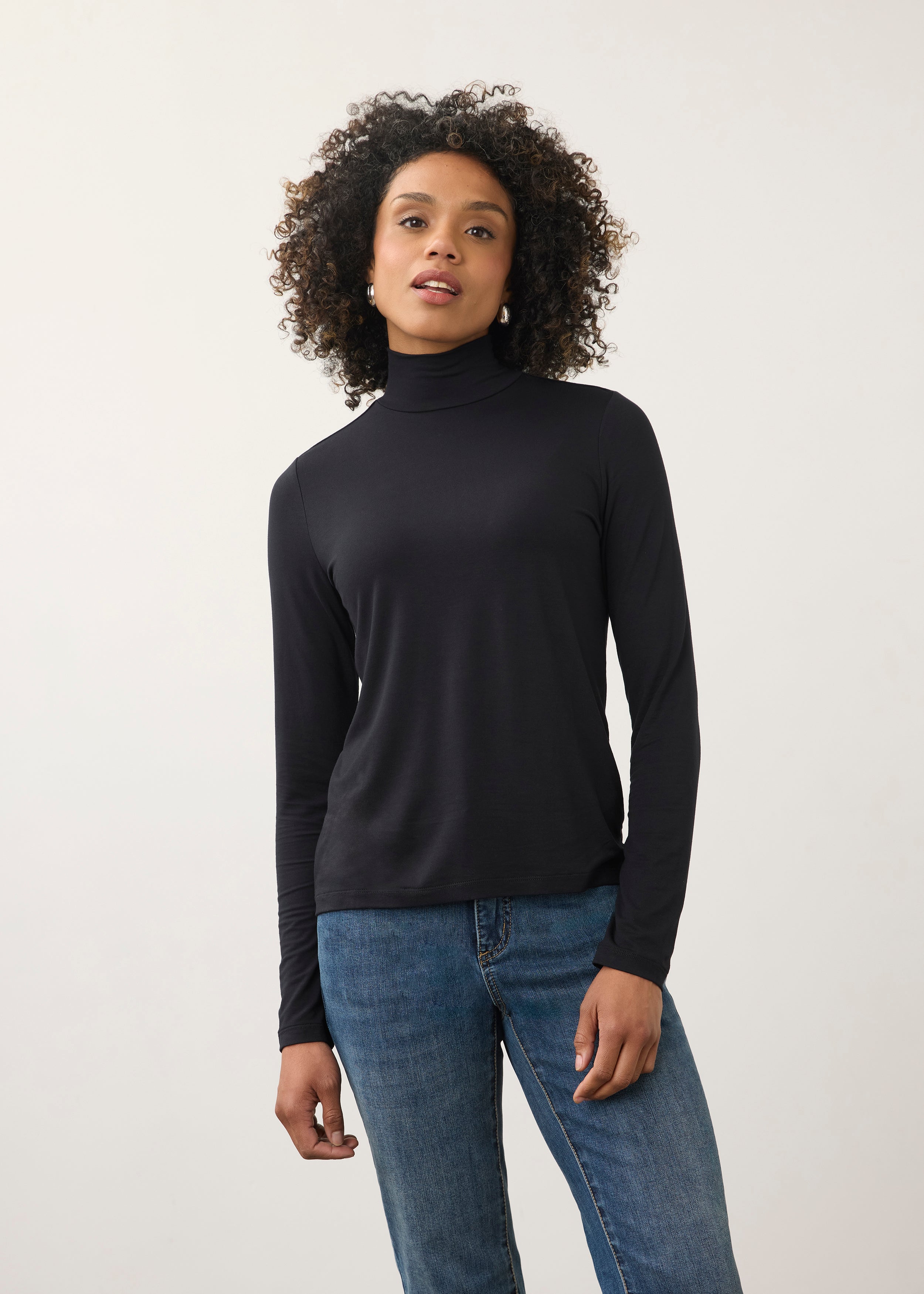 Front view of black turtleneck top with long sleeves and soft stretch fabric by French Dressing Jeans (FDJ)