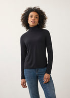 Front view of black turtleneck top with long sleeves and soft stretch fabric by French Dressing Jeans (FDJ)