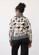 Back view of patterned sweater displaying full motif and ribbed hem by French Dressing Jeans (FDJ)