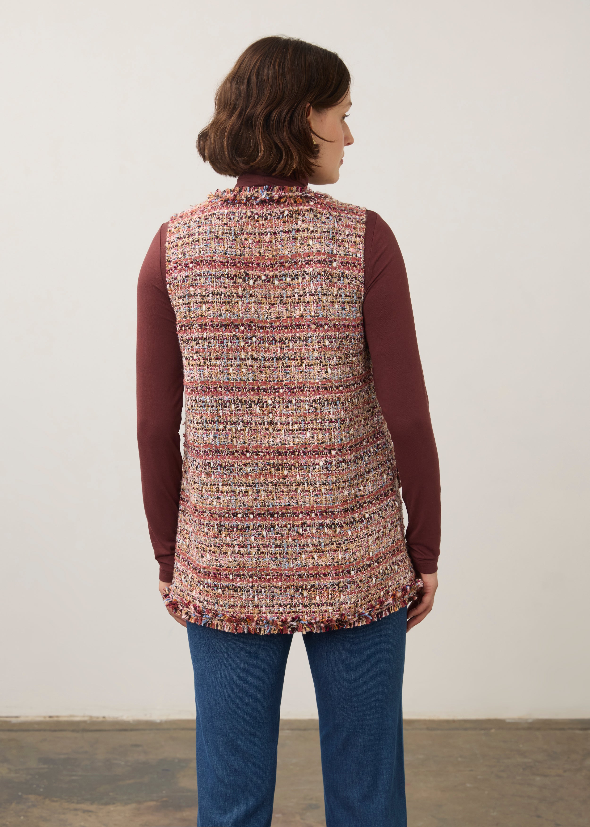 Back view of multicolored textured vest highlighting its longer length and tailored fit by French Dressing Jeans (FDJ)