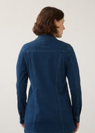 Back view of dark rinse long button-down jacket highlighting seam lines and fit by French Dressing Jeans (FDJ)