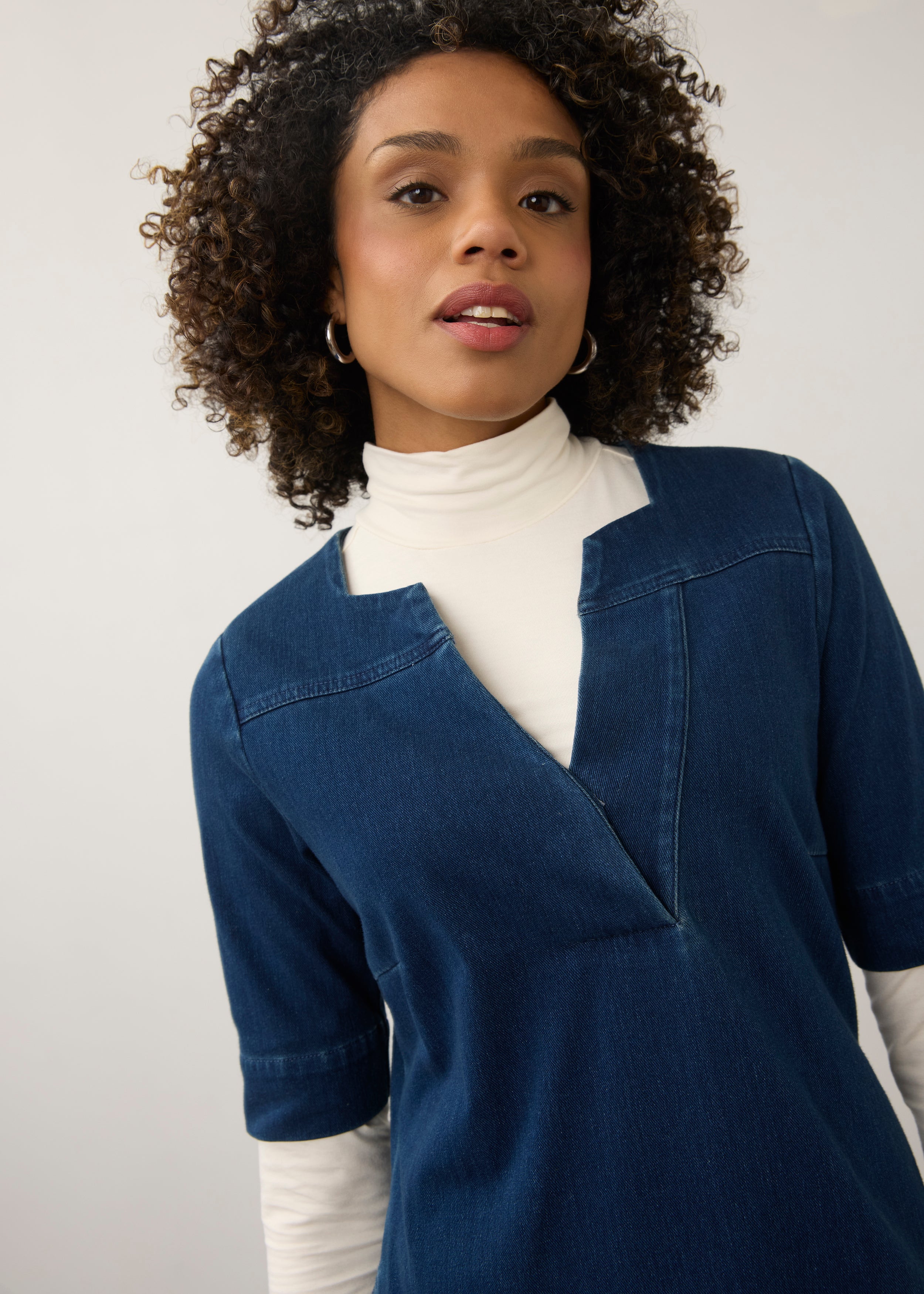 Detail of Elbow Sleeve Shift Dress in dark rinse focusing on neckline and stitching by French Dressing Jeans (FDJ)