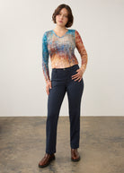 Full-body view of gradient long sleeve top paired with dark jeans by French Dressing Jeans (FDJ)
