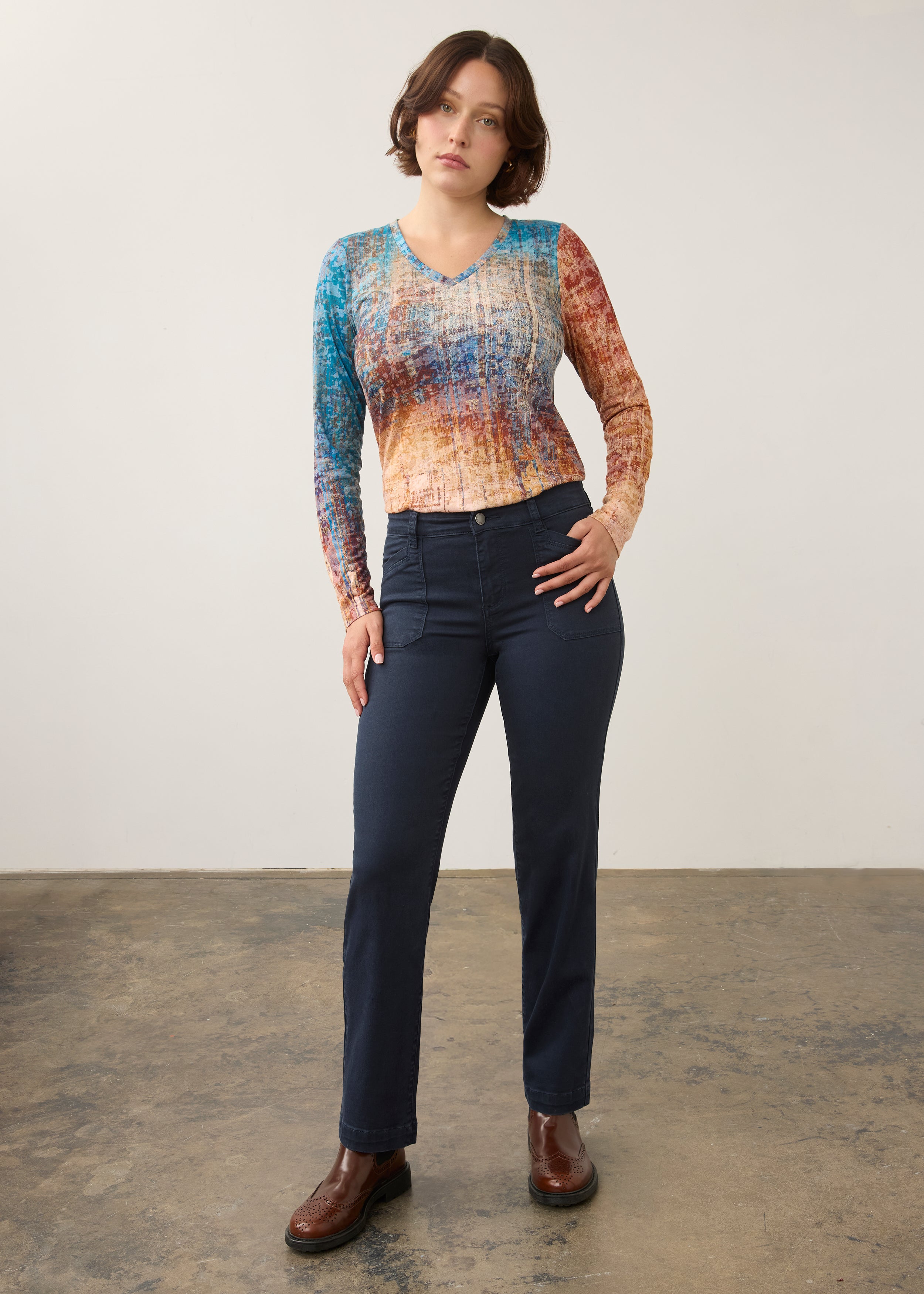 Full-body view of gradient long sleeve top paired with dark jeans by French Dressing Jeans (FDJ)