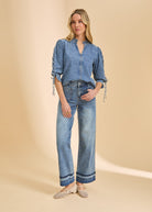 Full view of chambray shirt paired with light denim jeans by French Dressing Jeans (FDJ)