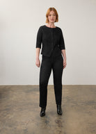 Black button-up top and jeans full outfit view showing sleek silhouette by French Dressing Jeans (FDJ)