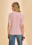 Back view of red striped V-neck top showing playful stripe pattern by French Dressing Jeans (FDJ)