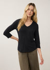 Front view of black 3/4 sleeve V-neck top with relaxed fit and soft fabric by French Dressing Jeans (FDJ)