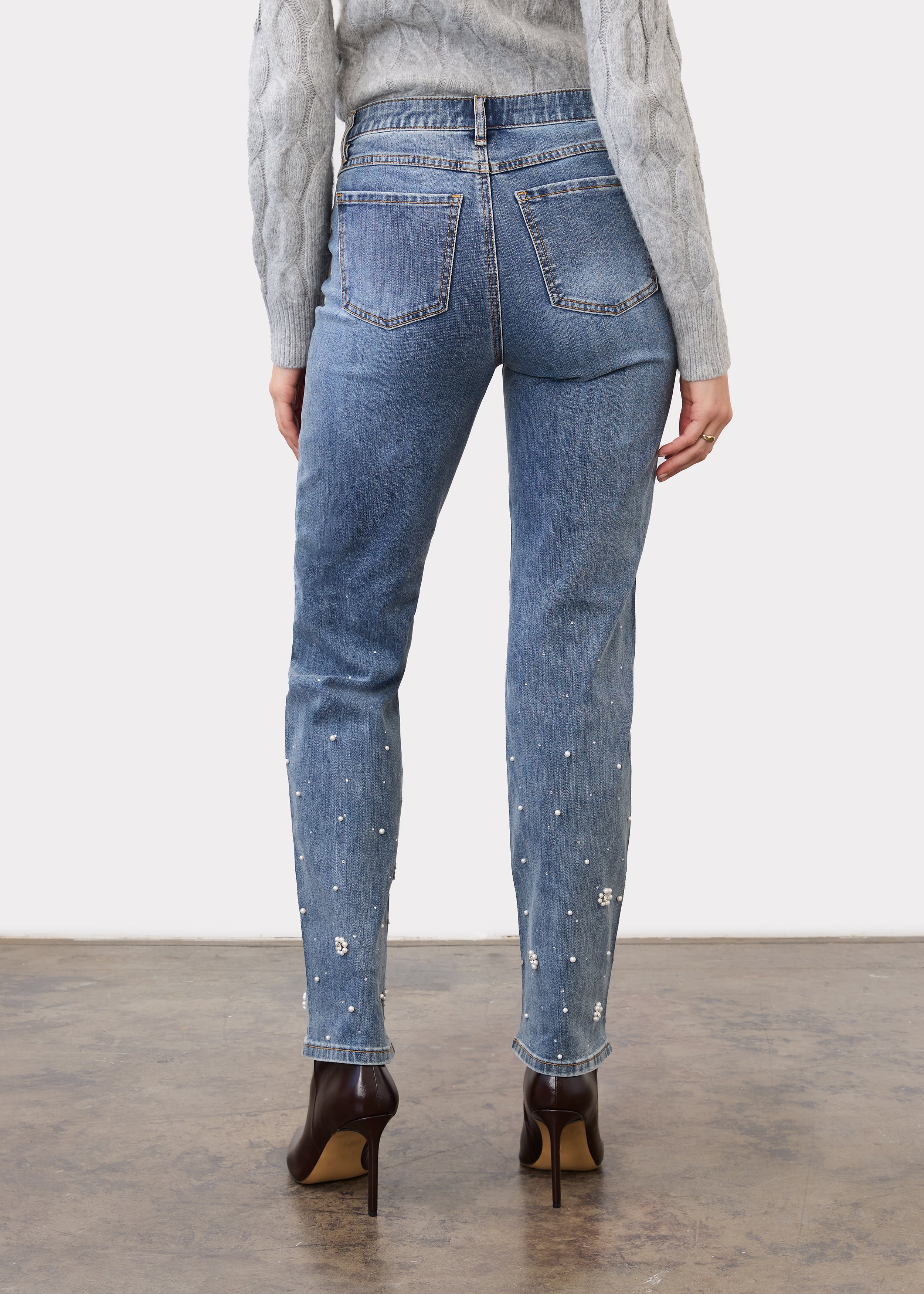 Back view of indigo jeans with pearl embellishments and patch pockets by French Dressing Jeans (FDJ)