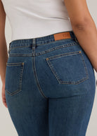 Detail shot of back pockets and waistline on dark wash Olivia straight leg denim by French Dressing Jeans (FDJ)