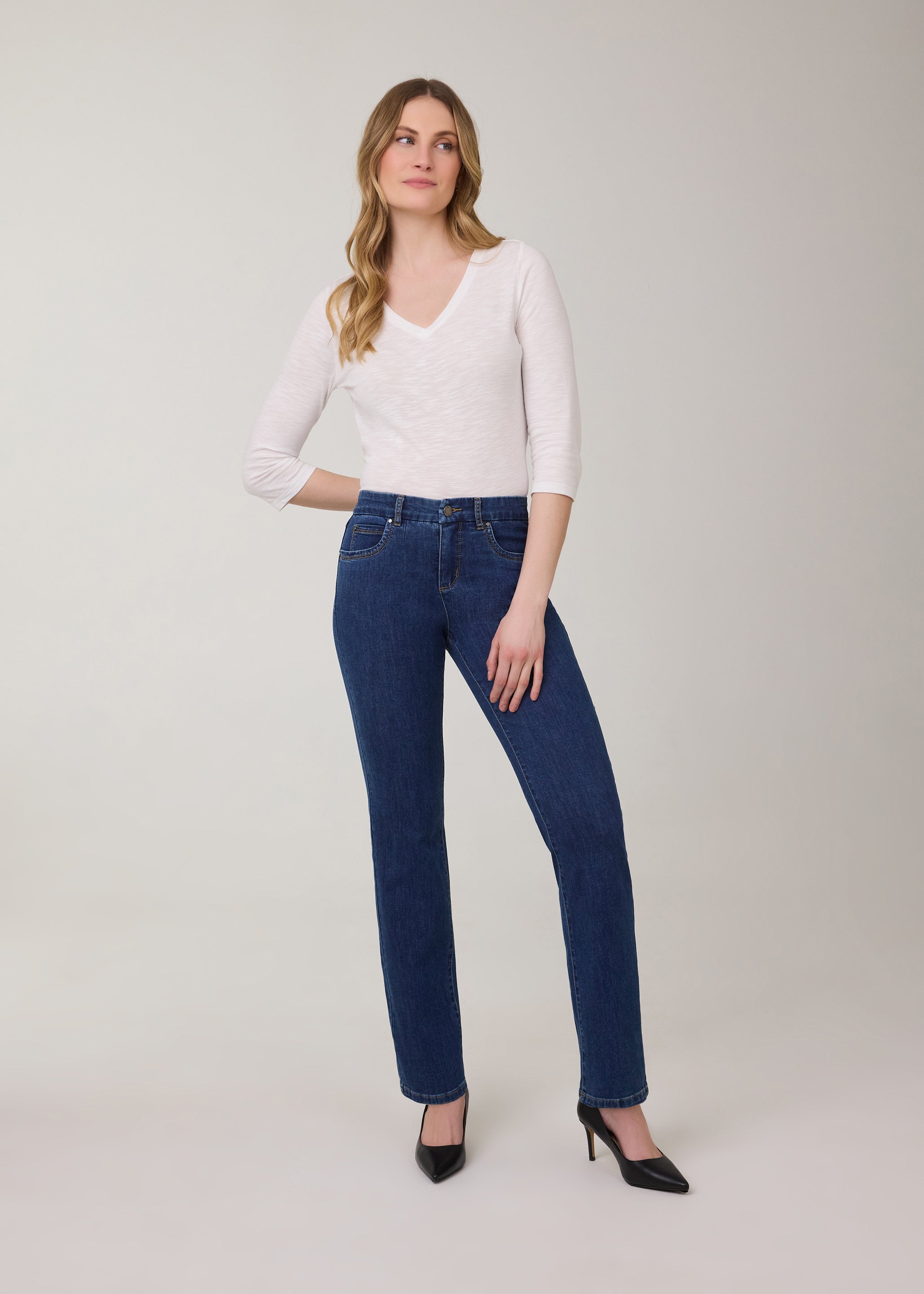 Model wearing classic straight leg jeans in Delight color by French Dressing Jeans (FDJ)
