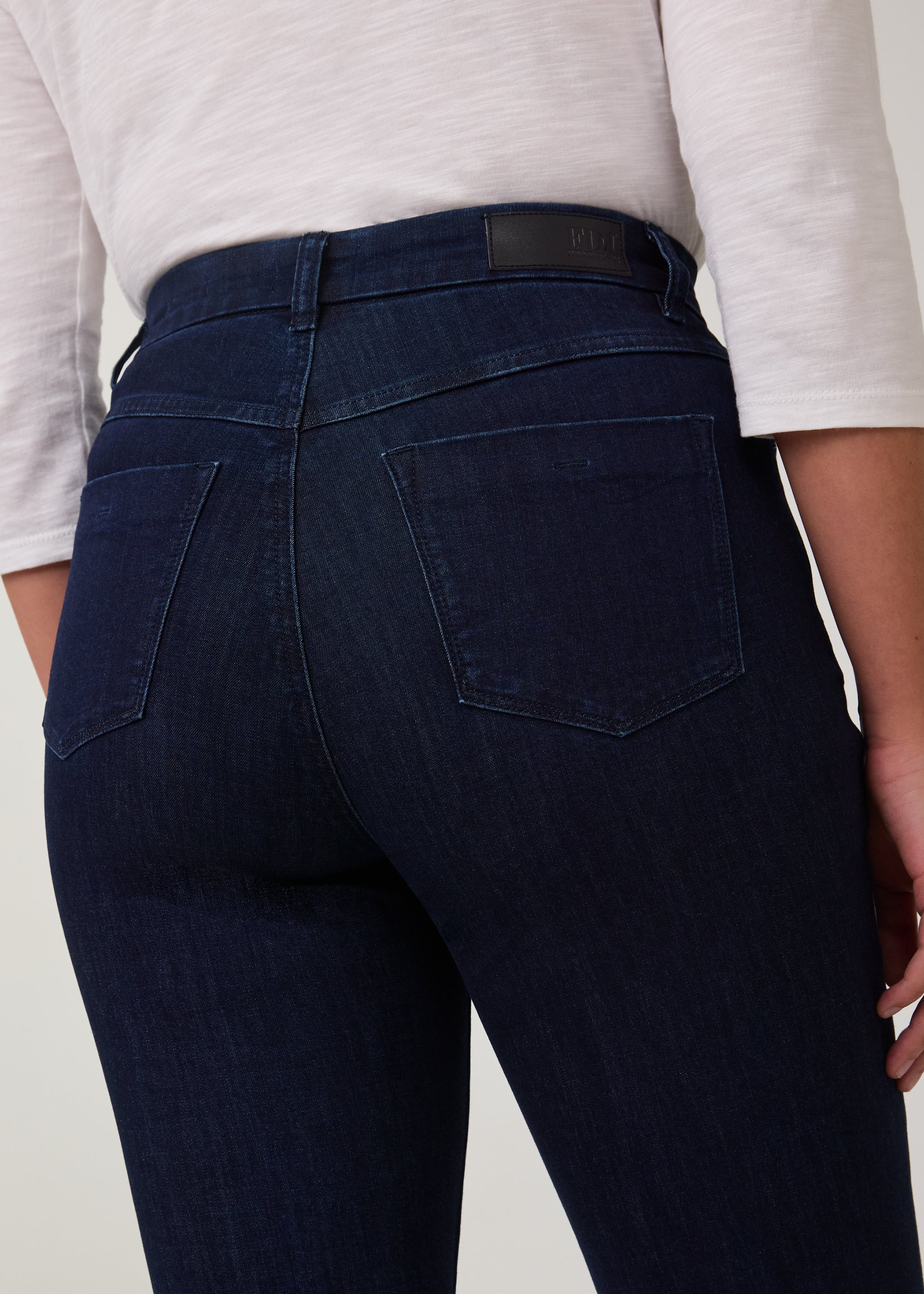 Detail of back pocket stitching on vibrant Delight jeans by French Dressing Jeans (FDJ)