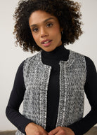 Close-up of black and white textured vest showing fringe detail and round neckline by French Dressing Jeans (FDJ)