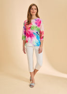 Front view of white cropped jeans, styled with colorful top by French Dressing Jeans (FDJ)
