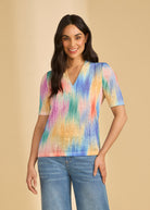 Front view of 3/4 sleeve V-neck top in Tropical Ikat with vibrant colors by French Dressing Jeans (FDJ)