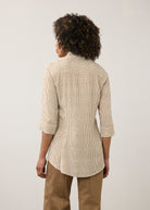 Back view of striped beige and white shirt highlighting long sleeves by French Dressing Jeans (FDJ)