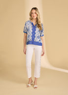 Full view of Sundial printed shirt paired with white pants by French Dressing Jeans (FDJ)