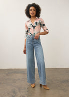 Detail shot of buttoned slit cuffs on medium blue Olivia denim by French Dressing Jeans (FDJ)