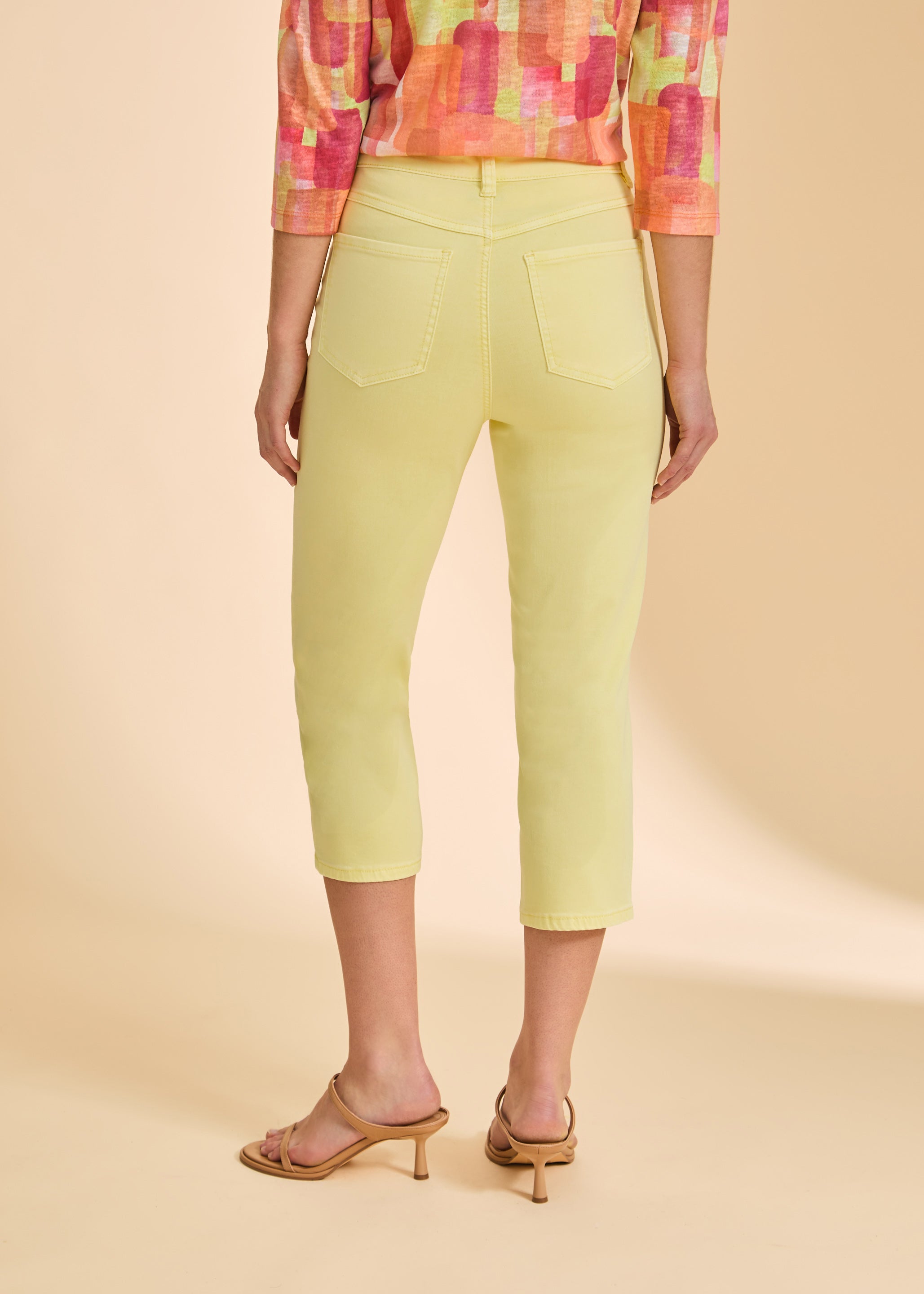 Back view of yellow cropped jeans, highlighting tailored pocket design by French Dressing Jeans (FDJ)