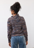 Back view of indigo spacedye sweater showing enveloppe collar and ribbed hem by French Dressing Jeans (FDJ)