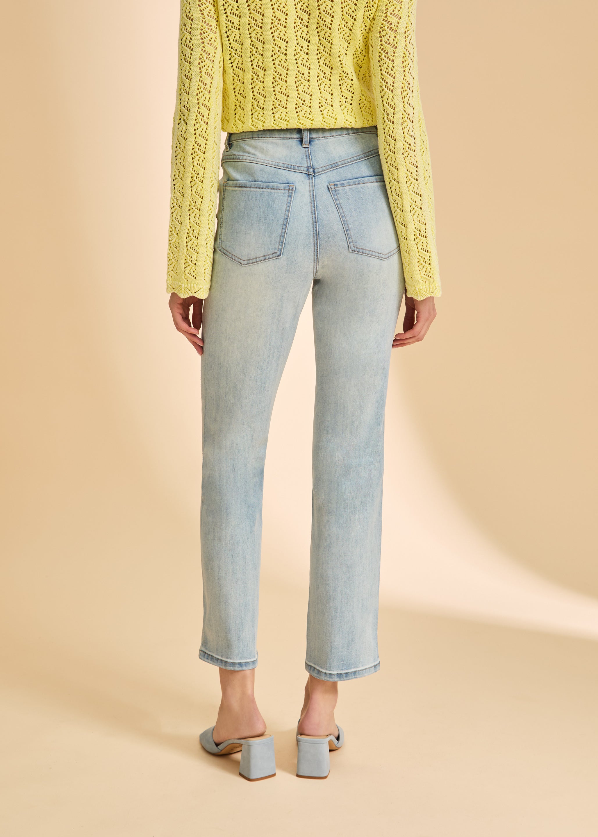 Back view of embellished light wash jeans with patch pockets by French Dressing Jeans (FDJ)