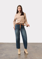 Full outfit view with light camel sweater paired with jeans and boots by French Dressing Jeans (FDJ)