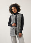 Front view of black and white textured vest with patch pockets and fringe detailing by French Dressing Jeans (FDJ)