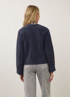 Back view of navy knit cardigan highlighting clean seam lines by French Dressing Jeans (FDJ)