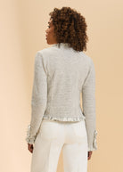 Back view of cream tweed jacket showcasing subtle check pattern and fringe by French Dressing Jeans (FDJ)