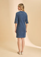 Back view of denim dress showing simple design and mid-length cut by French Dressing Jeans (FDJ)
