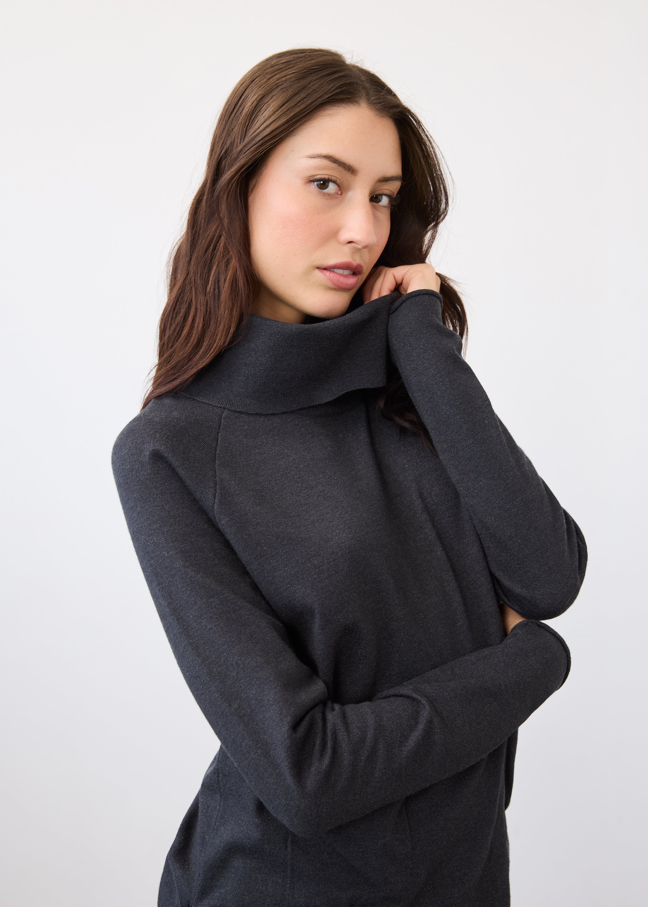 Side profile of charcoal sweater highlighting cowl neck detail by French Dressing Jeans (FDJ)