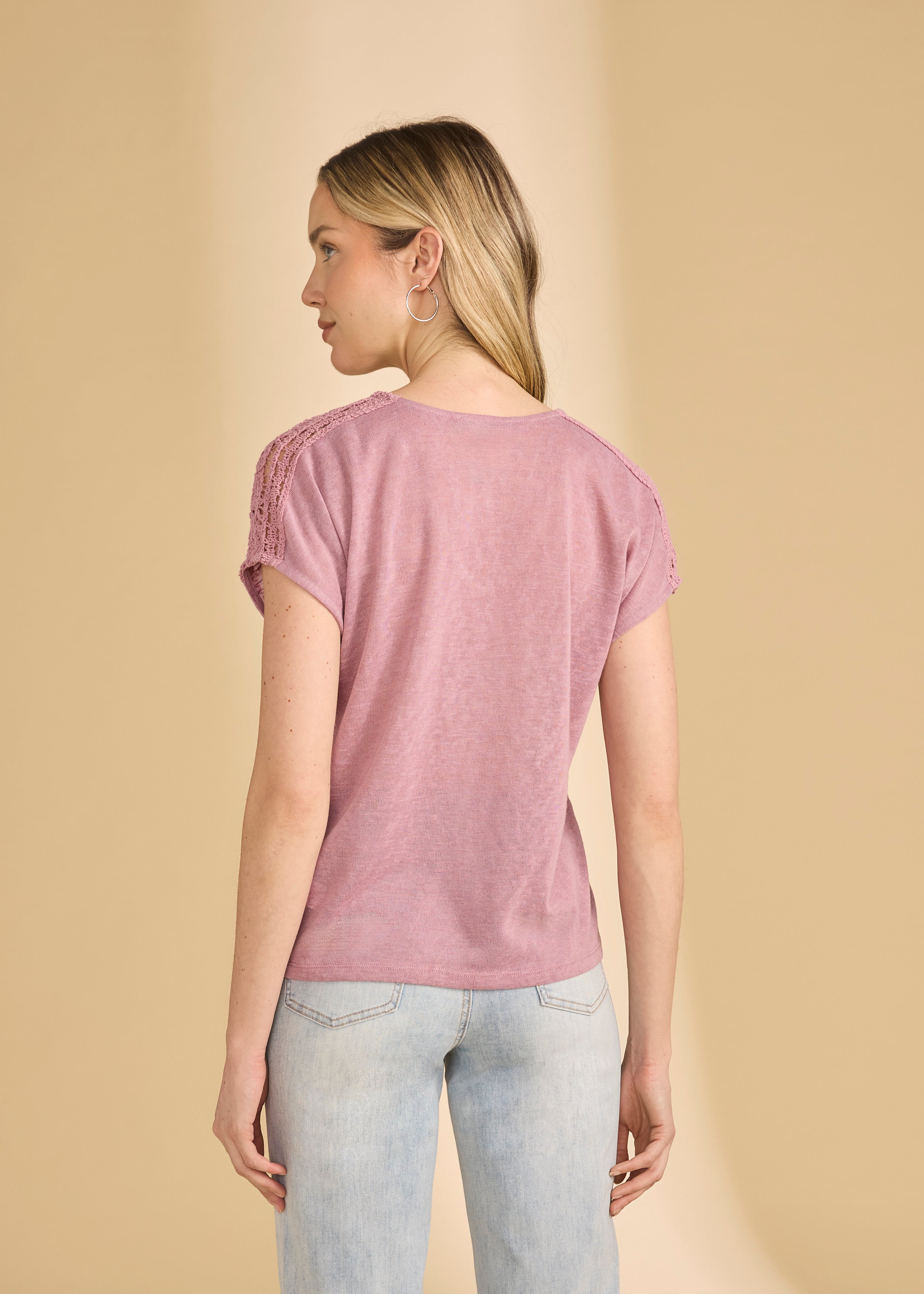 Back view of pink V-neck top highlighting crochet shoulder details by French Dressing Jeans (FDJ)