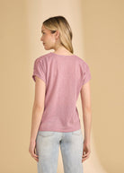Back view of pink V-neck top highlighting crochet shoulder details by French Dressing Jeans (FDJ)