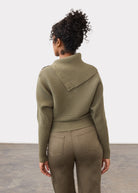 Back view of olive sweater highlighting ribbed design and button embellishments by French Dressing Jeans (FDJ)