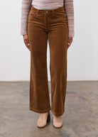 Front view of camel Olivia wide leg pants showing mid-rise and front pocket detail by French Dressing Jeans (FDJ)