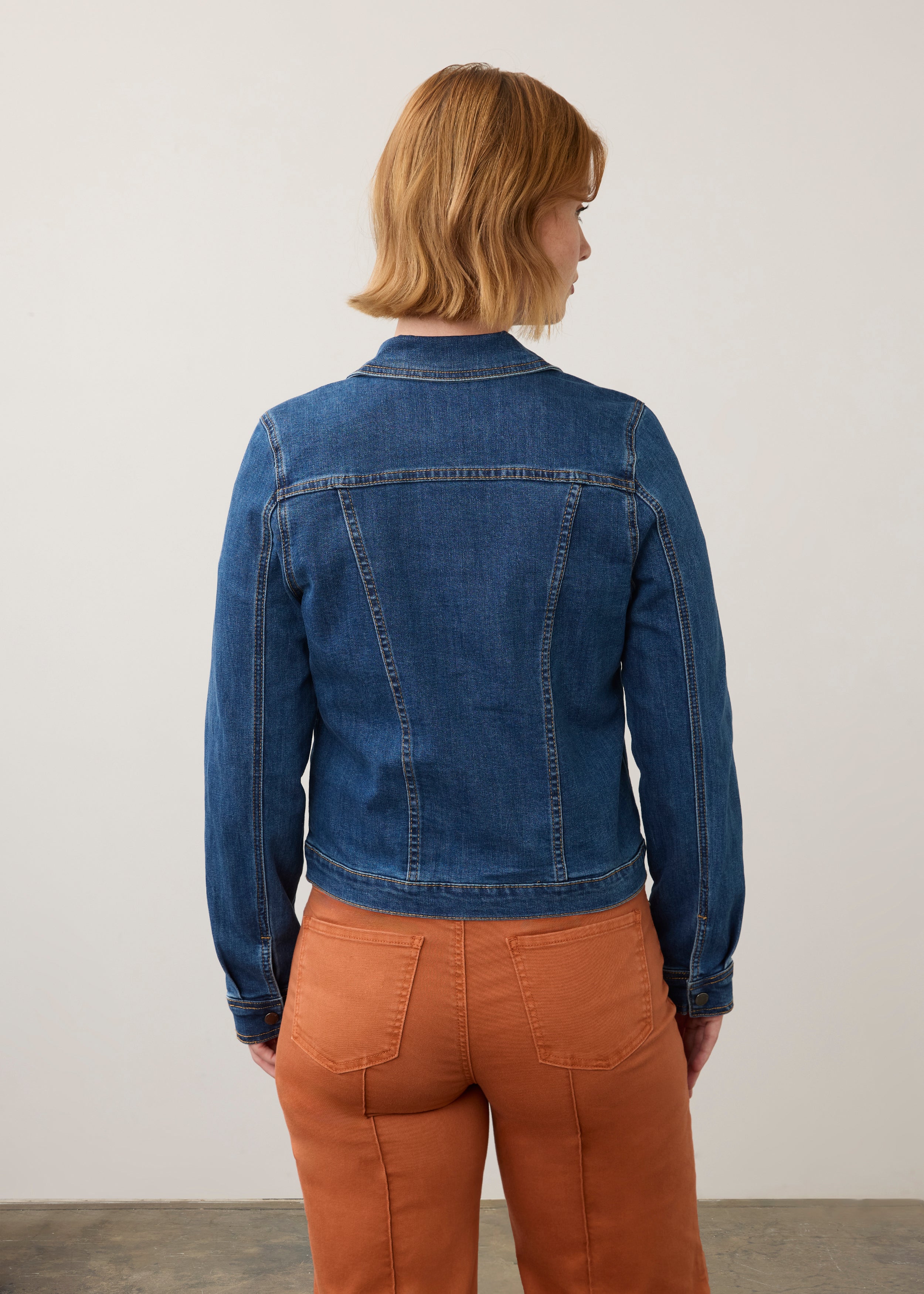 Back view of denim jacket showing tailored fit and classic stitching by French Dressing Jeans (FDJ)