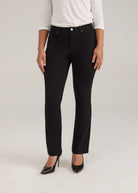 Front view of black pants with silver button and sleek design by French Dressing Jeans (FDJ)