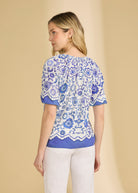 Back view of Sundial printed shirt highlighting detailed floral pattern by French Dressing Jeans (FDJ)