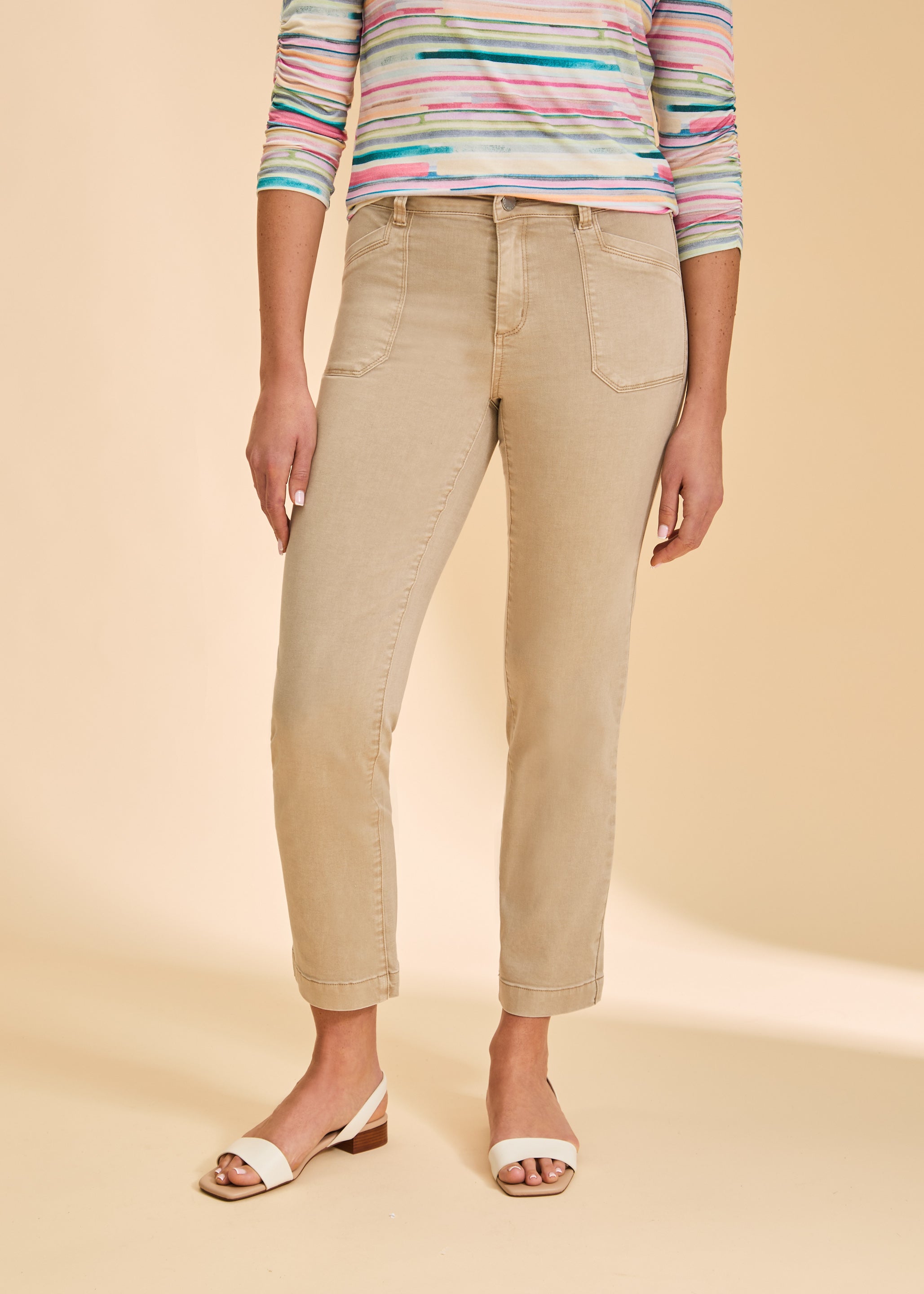 Close-up of beige pants with front pockets by French Dressing Jeans (FDJ)